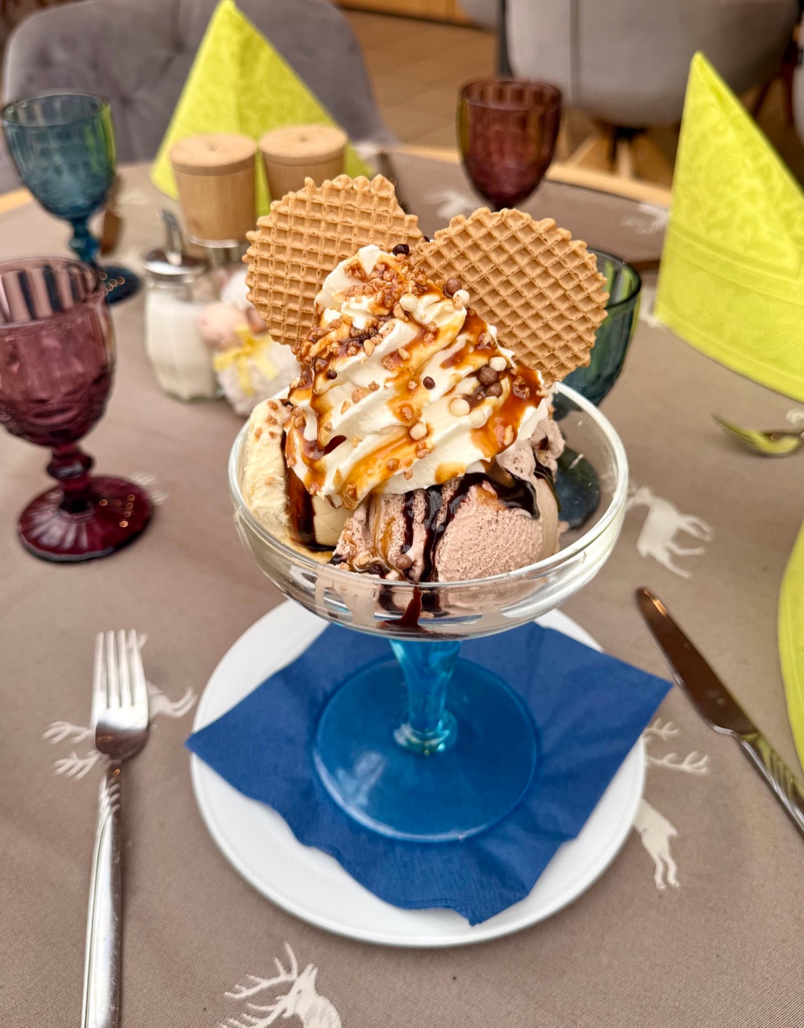 Krokant ice cream sundae with caramel brittle and whipped cream at Zentrum Café Restaurant