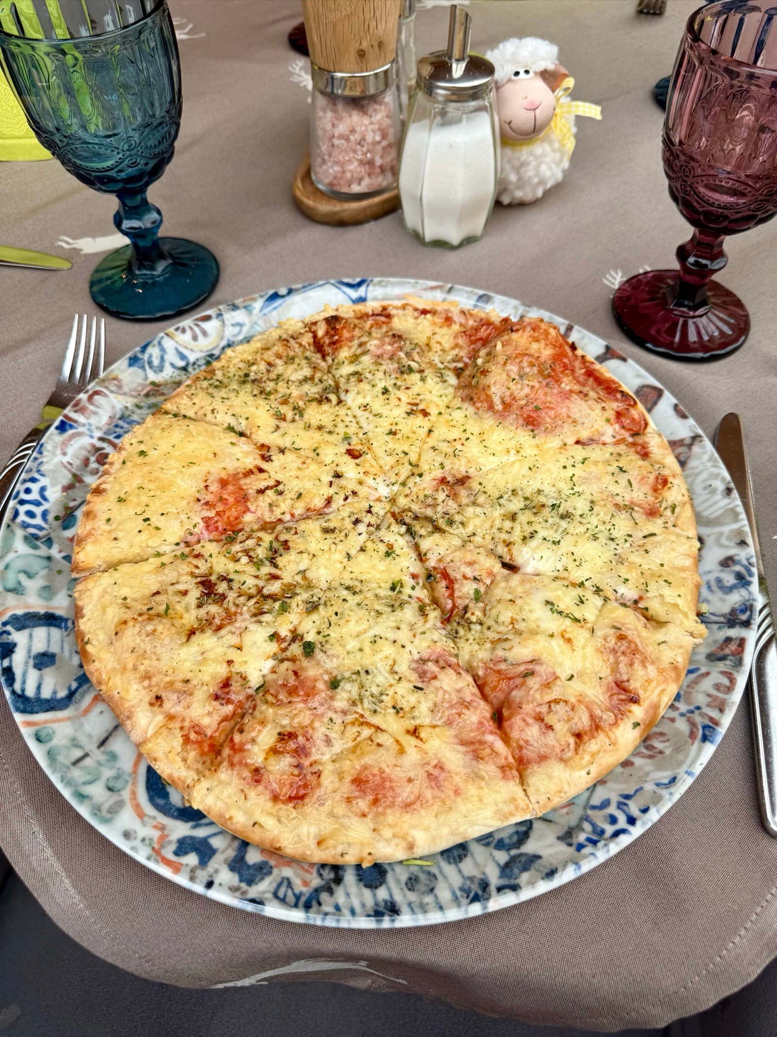 Classic Pizza Margherita with tomato sauce, mozzarella and basil at Zentrum Café Restaurant