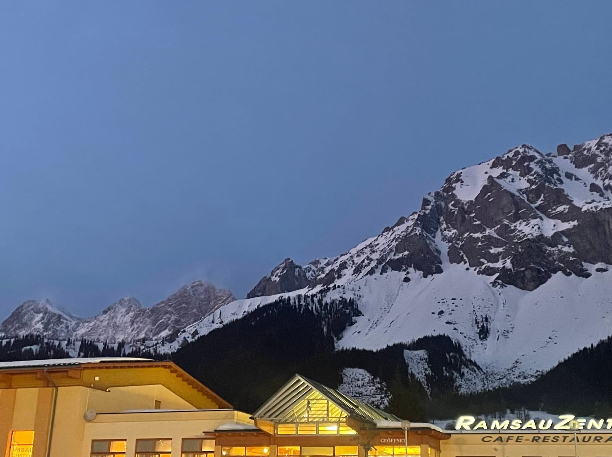 Majestic Alpine mountain peaks rising above the valley (placeholder image)